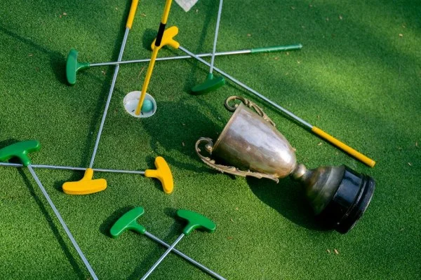 golf tournament trophy celebration